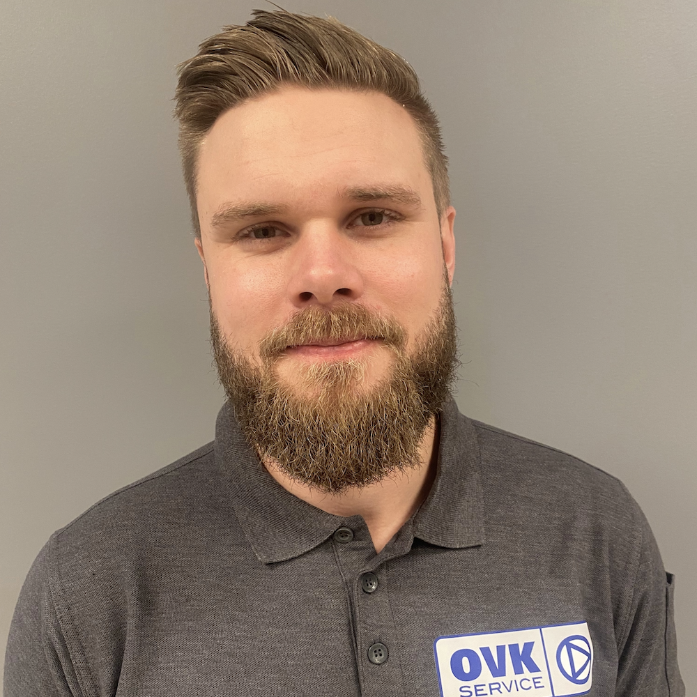 Male in blue shirt
